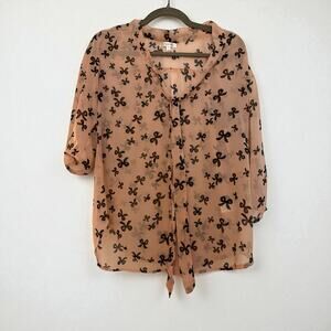 Marisol sheer pink blouse with black bow print. Size medium.